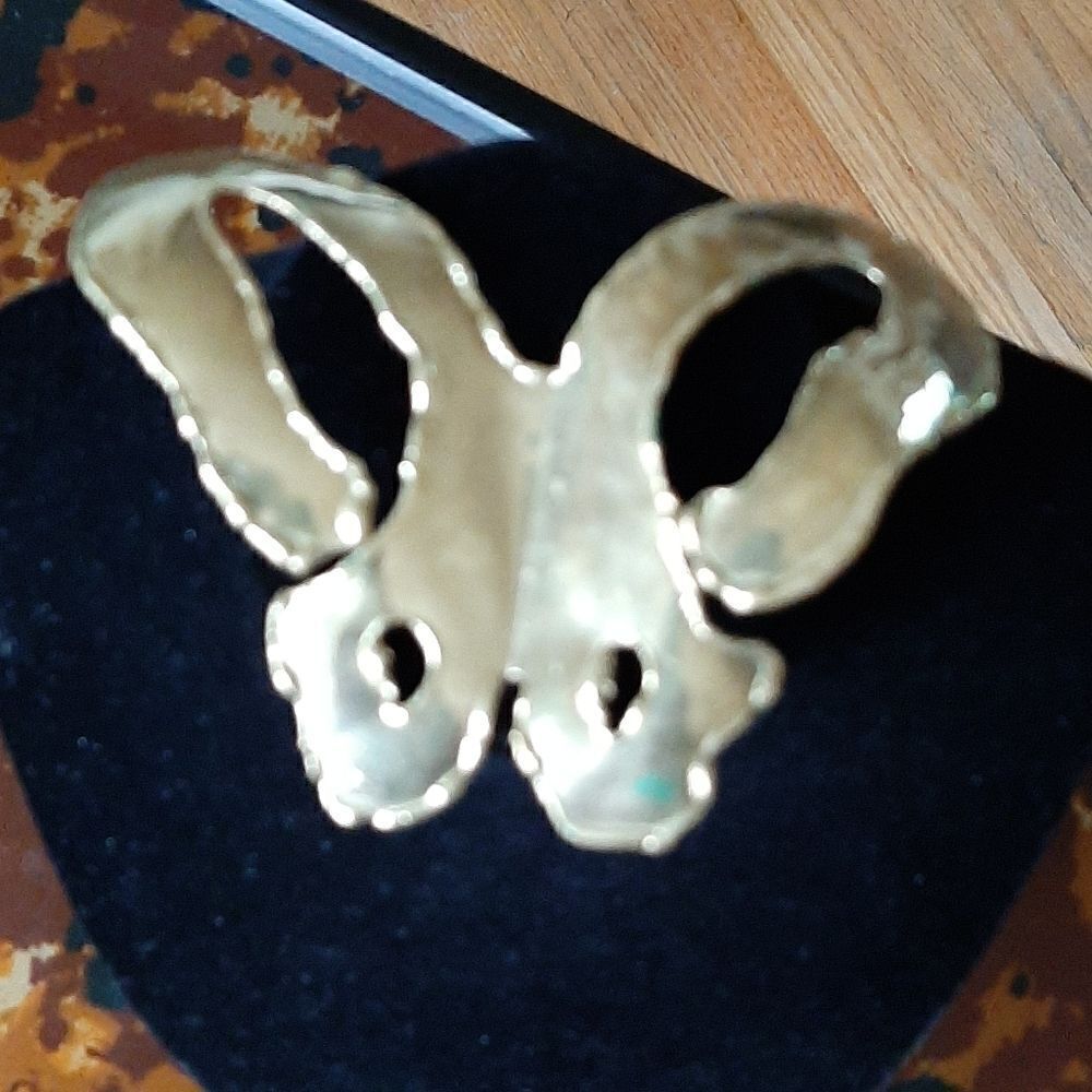 Brass butterfly clasp.  